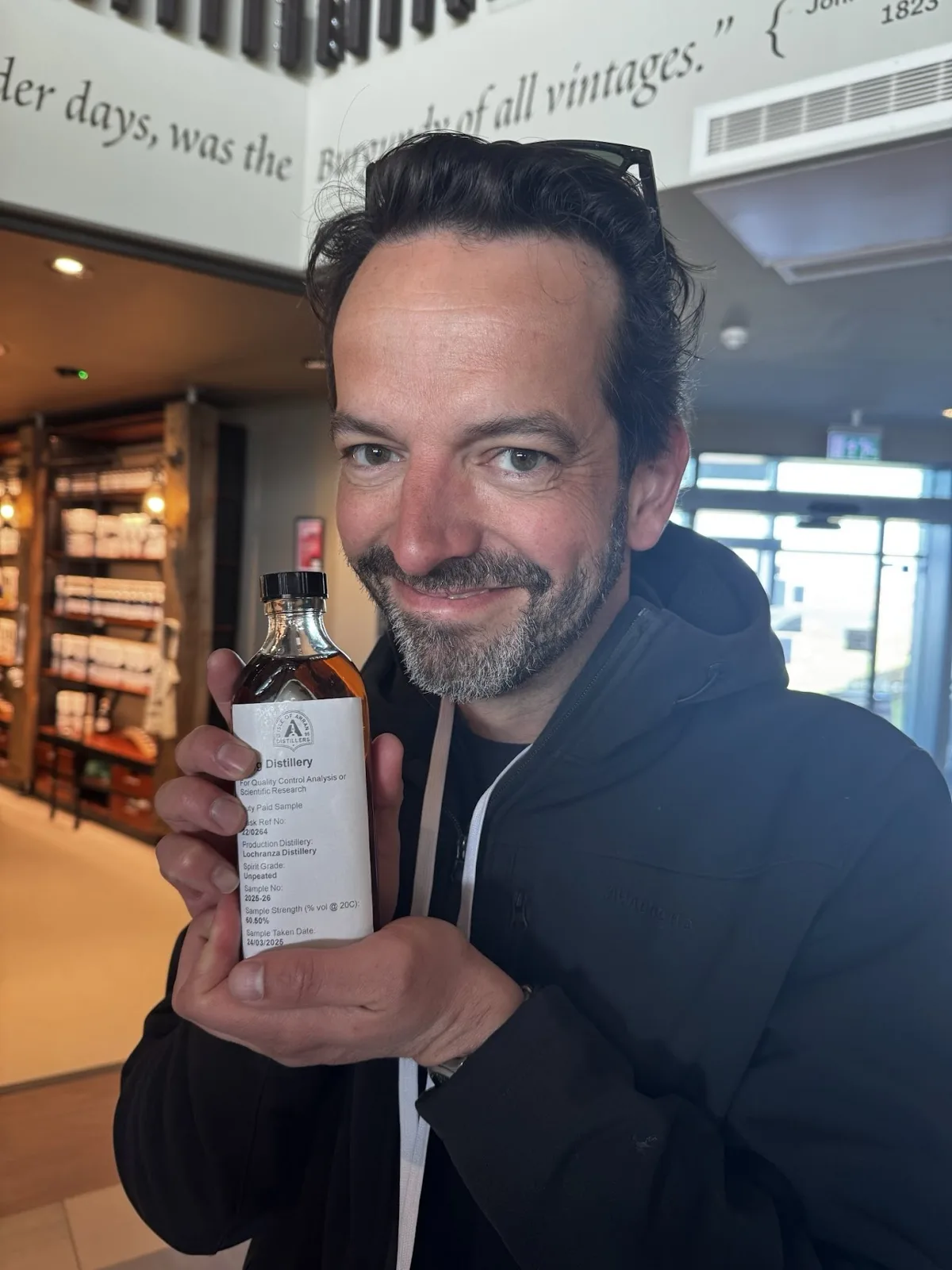 Mike holding a sample of his own whisky